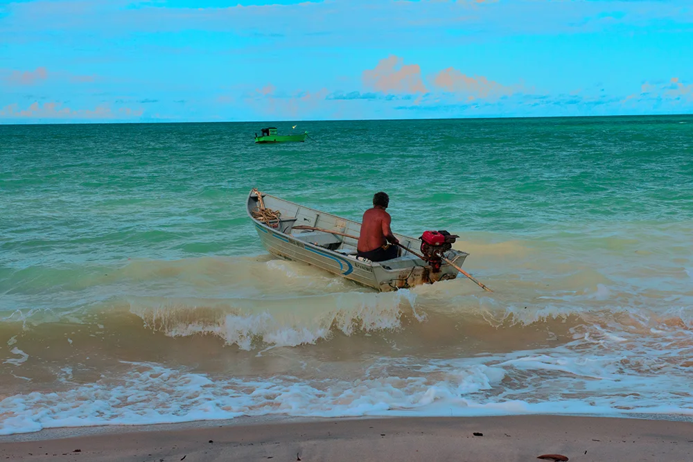 seu-albino-saindo de canoa-pro-mar-