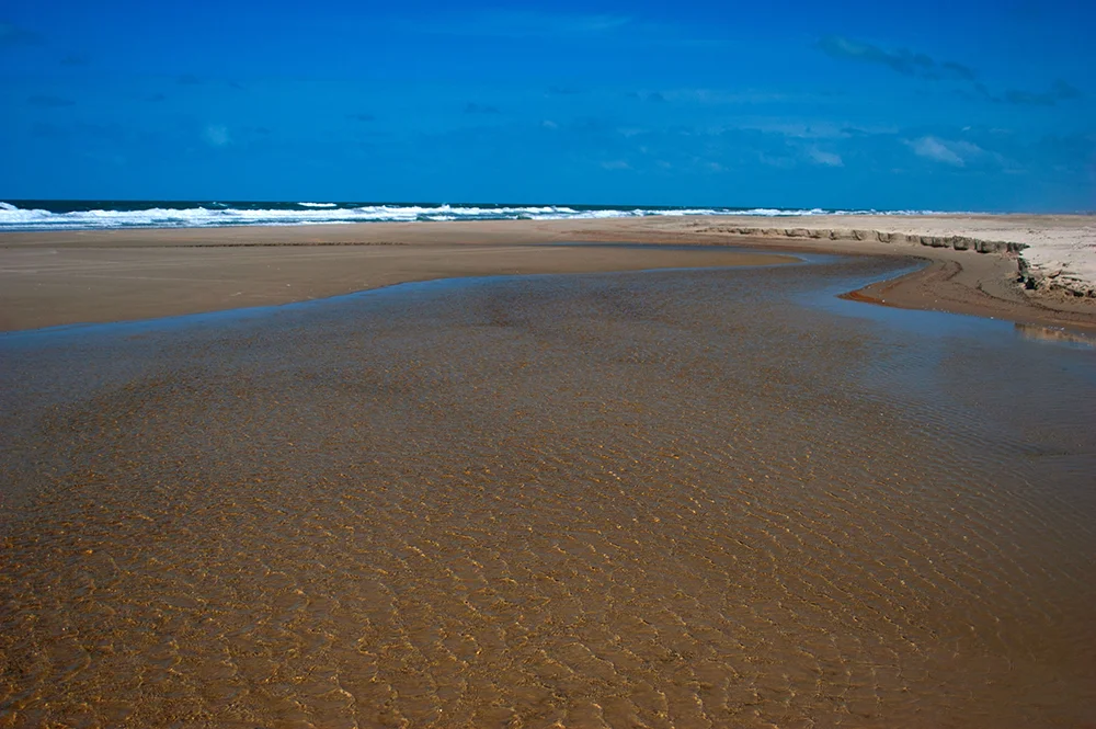 imagem de arroio na praia do Cassino